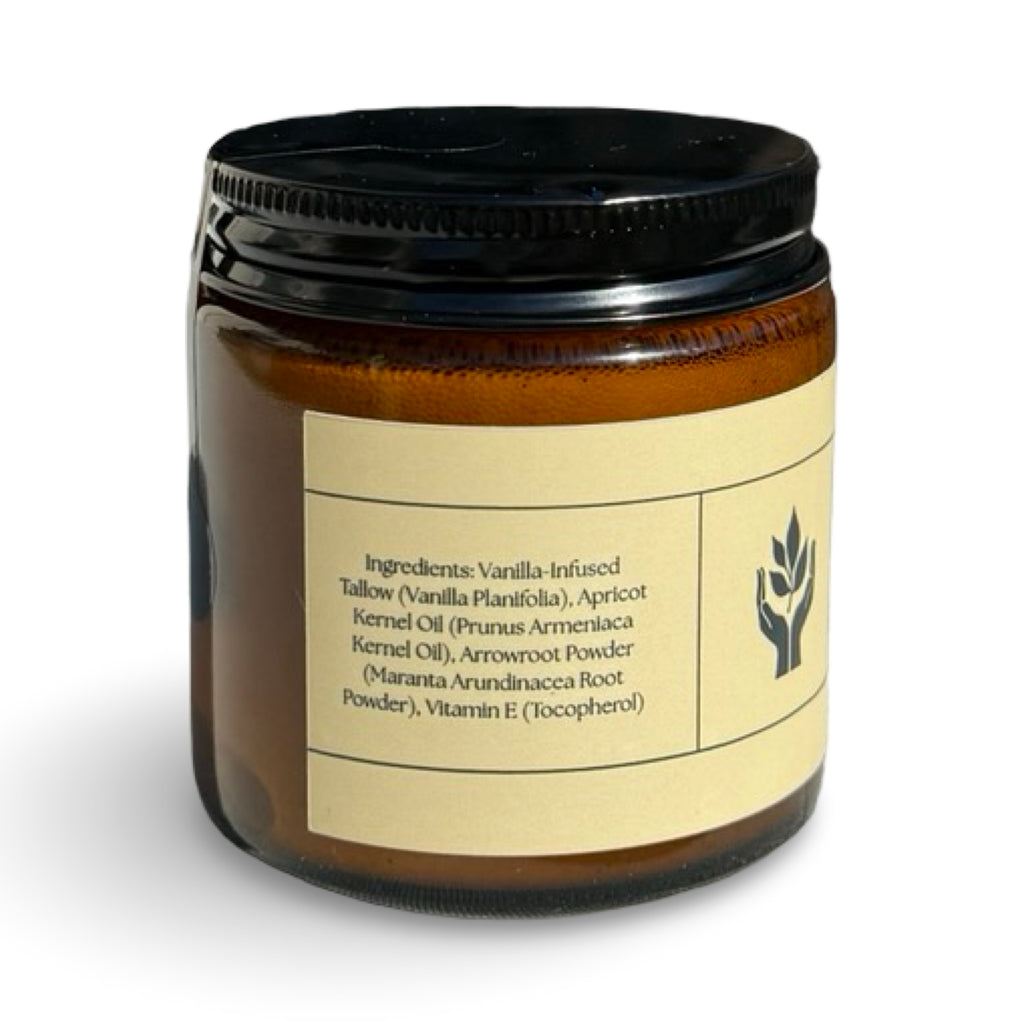 Close-up of Present Body Co. Vanilla grass fed tallow balm jar.