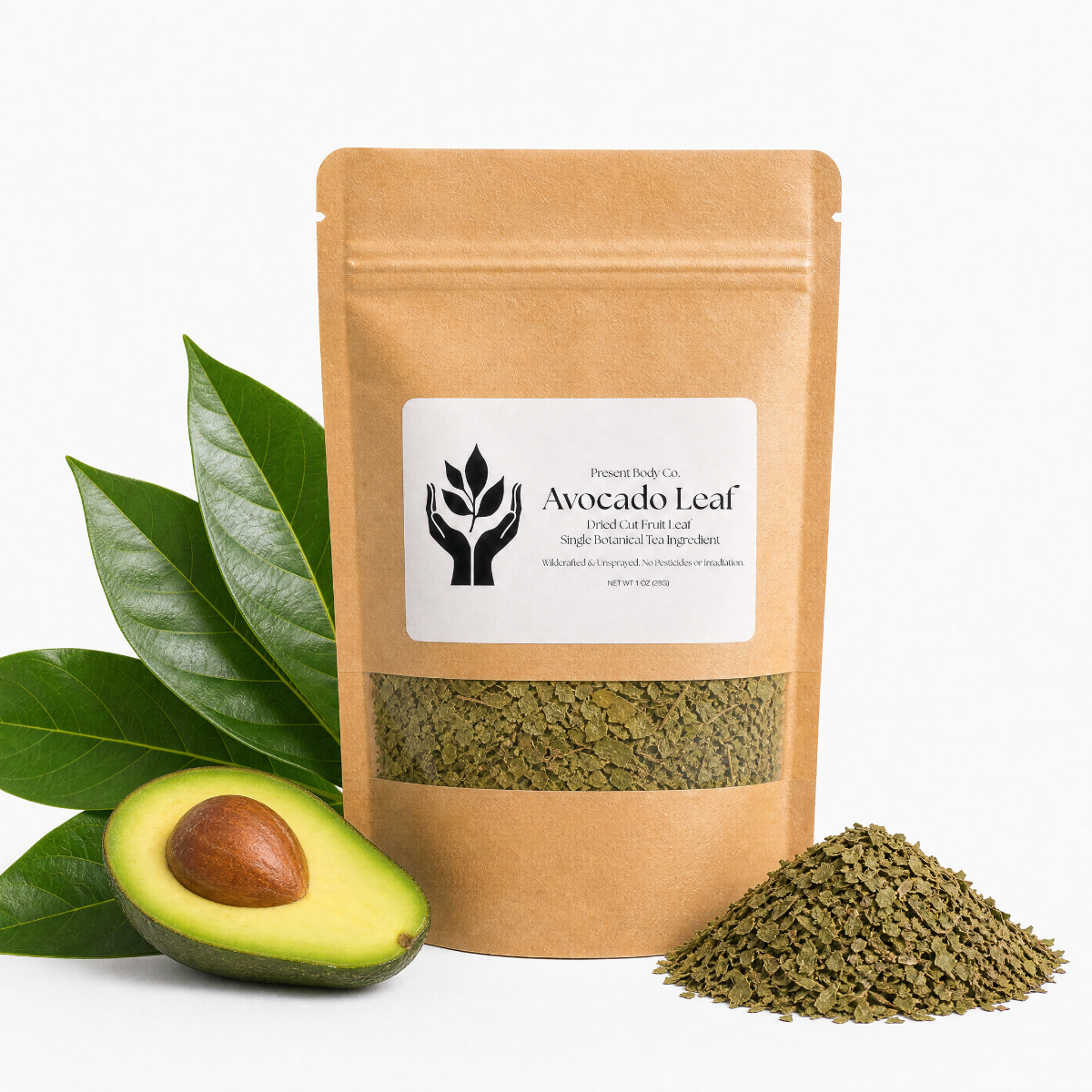 A kraft paper stand-up pouch labeled 'Avocado Leaf' stands on a white background, styled with green avocado leaves, a cut avocado half, and a small pile of the dried leaf product.