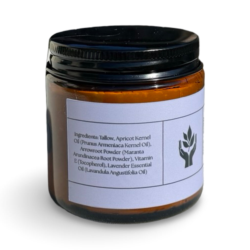 Close-up of Present Body Co. Lavender grass fed tallow balm jar.