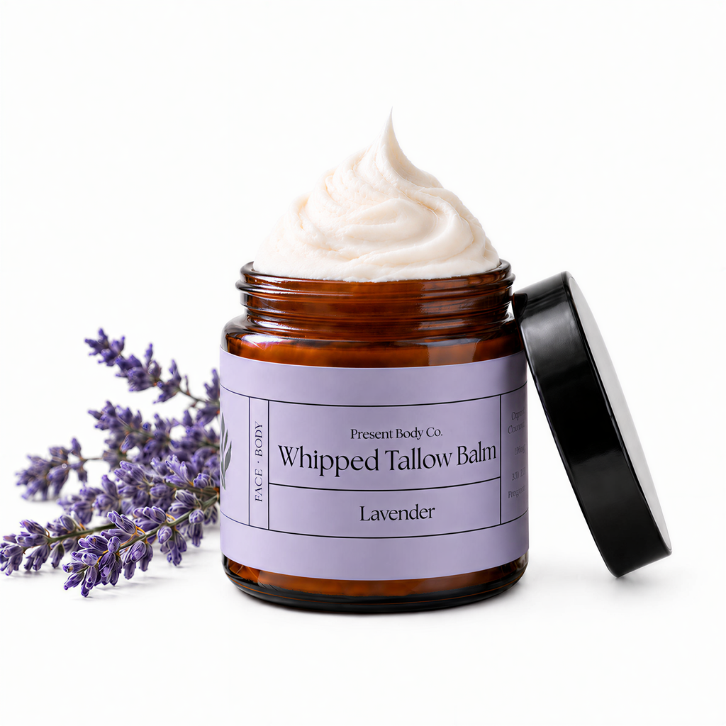 Present Body Co. Lavender Whipped Tallow Balm in a 4 oz amber glass jar.