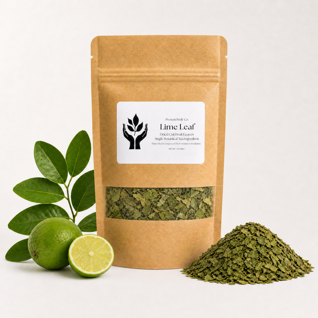 A kraft paper stand-up pouch labeled Lime Leaf by Proud Leaf Co, shown with green lime leaves, a whole lime, and a pile of dried lime leaf extract on a clean white background.