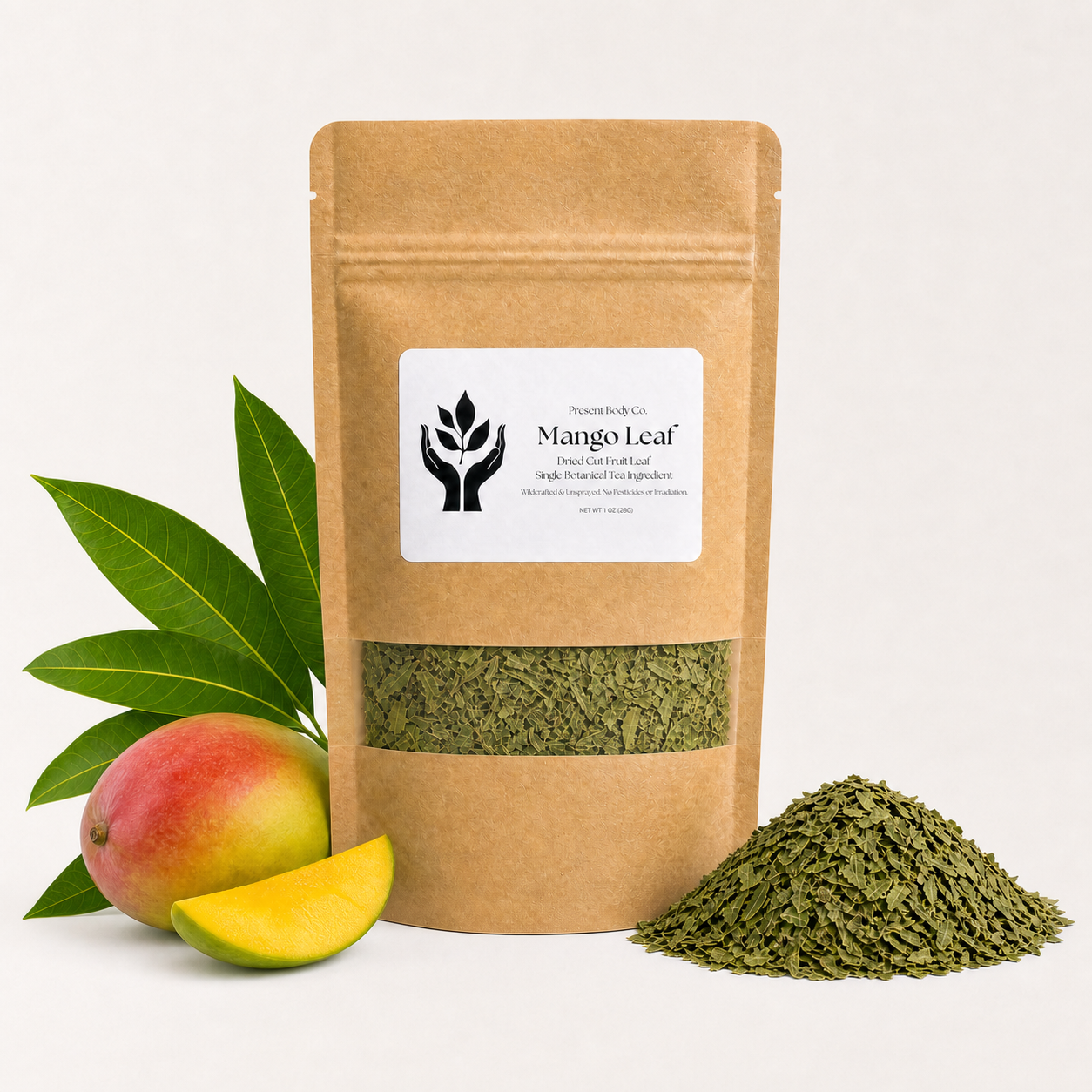 A kraft paper stand-up pouch labeled Mango Leaf by Powered Body Co., shown with green leaf flakes visible through a window and a small pile of the same flakes beside it.