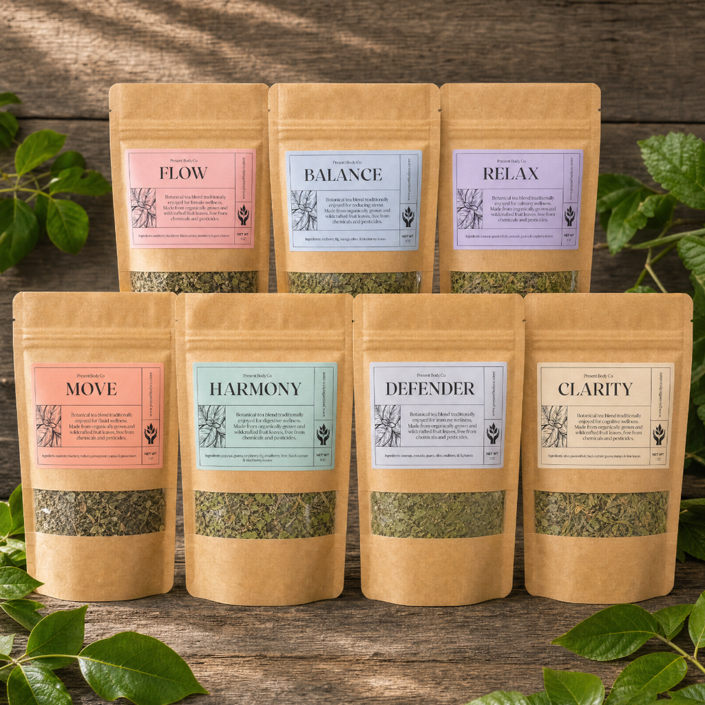 Six kraft paper stand-up pouches of herbal tea arranged on a rustic wooden surface with green leaves around them. The labels read Flow, Balance, Relax, Move, Harmony, Defender, and Clarity.