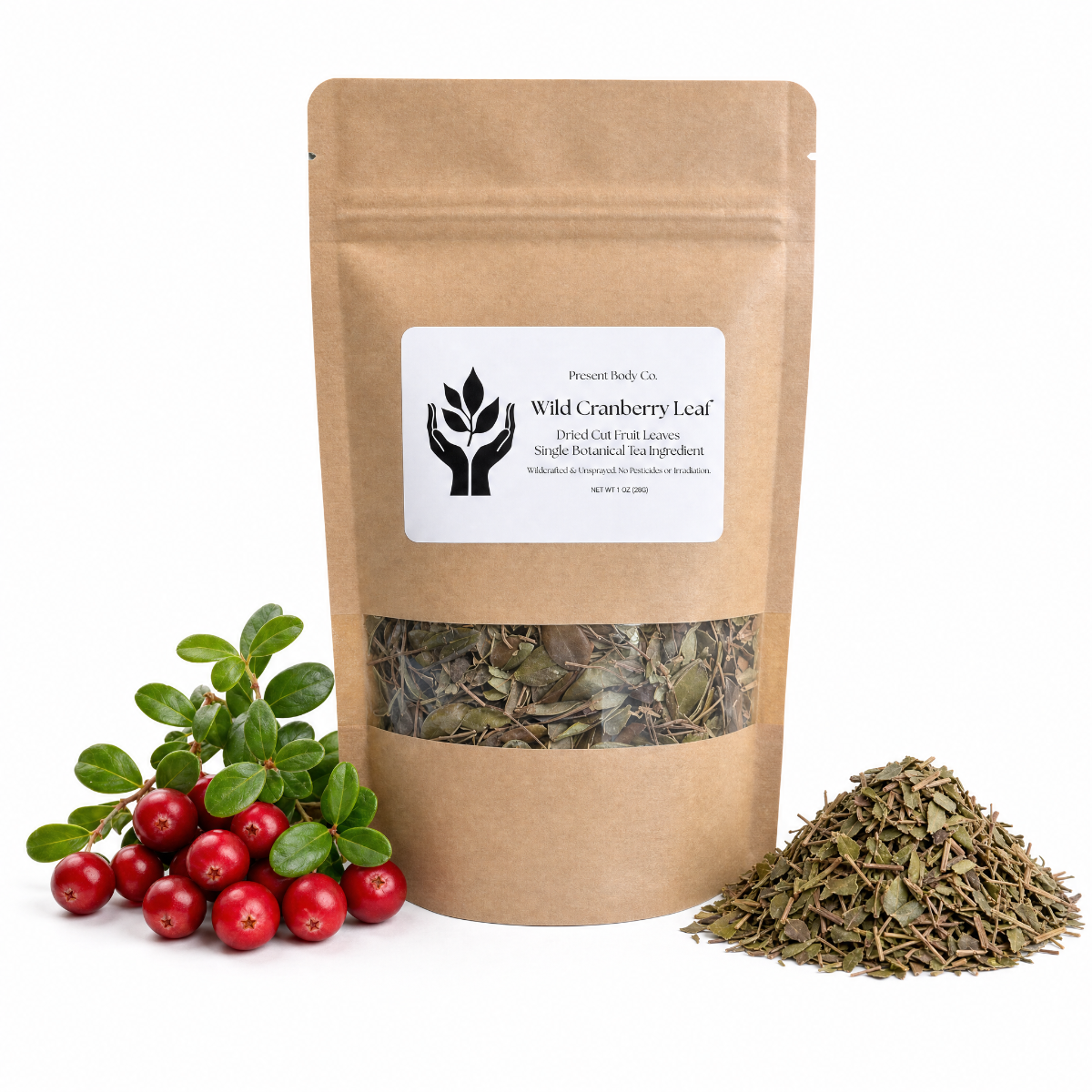 A kraft paper stand-up pouch labeled 'Present Body Co. Wild Cranberry Leaf' with a clear window showing dried leaves inside, styled with a cluster of red cranberries and green leaves on the left and a small pile of dried cranberry leaves on the right, on a white background.